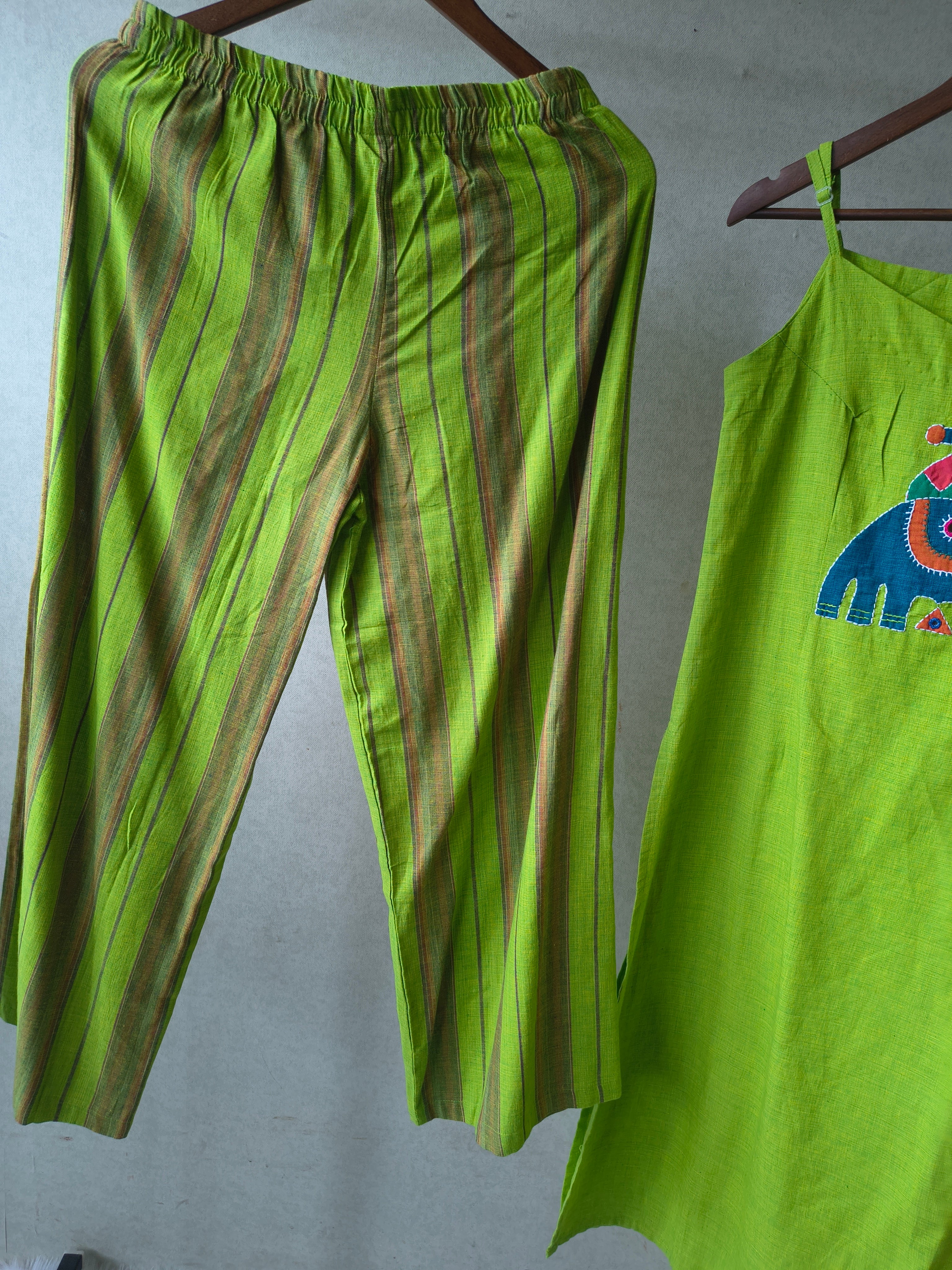 Image of Lime Green Sleeveless Cotton Kurta Set with Tribal Elephant Appliqué & Striped Straight Pants