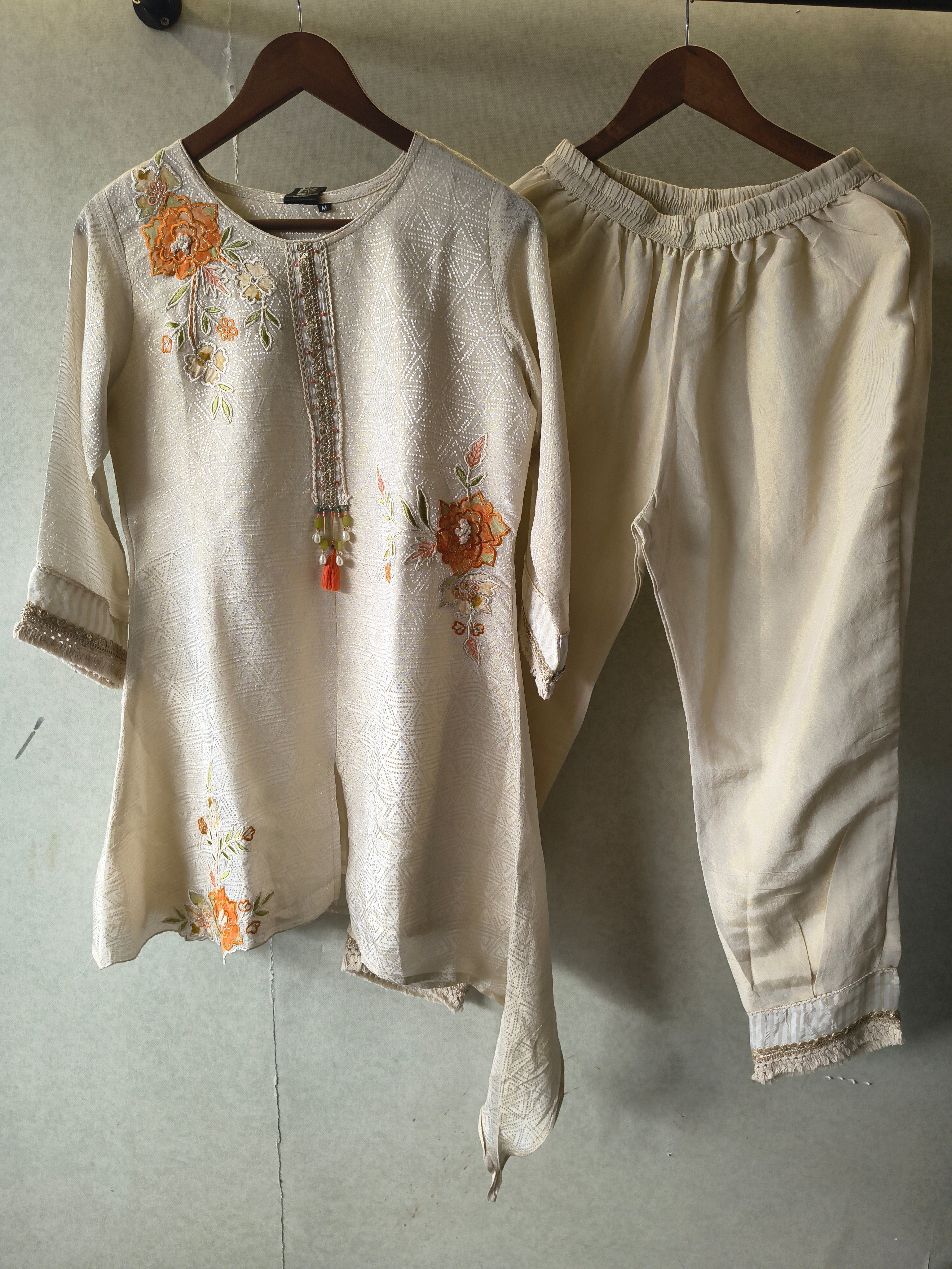 Image of Ivory Floral Embroidered Premium Asymmetrical Kurta Pant Co-Ord Set
