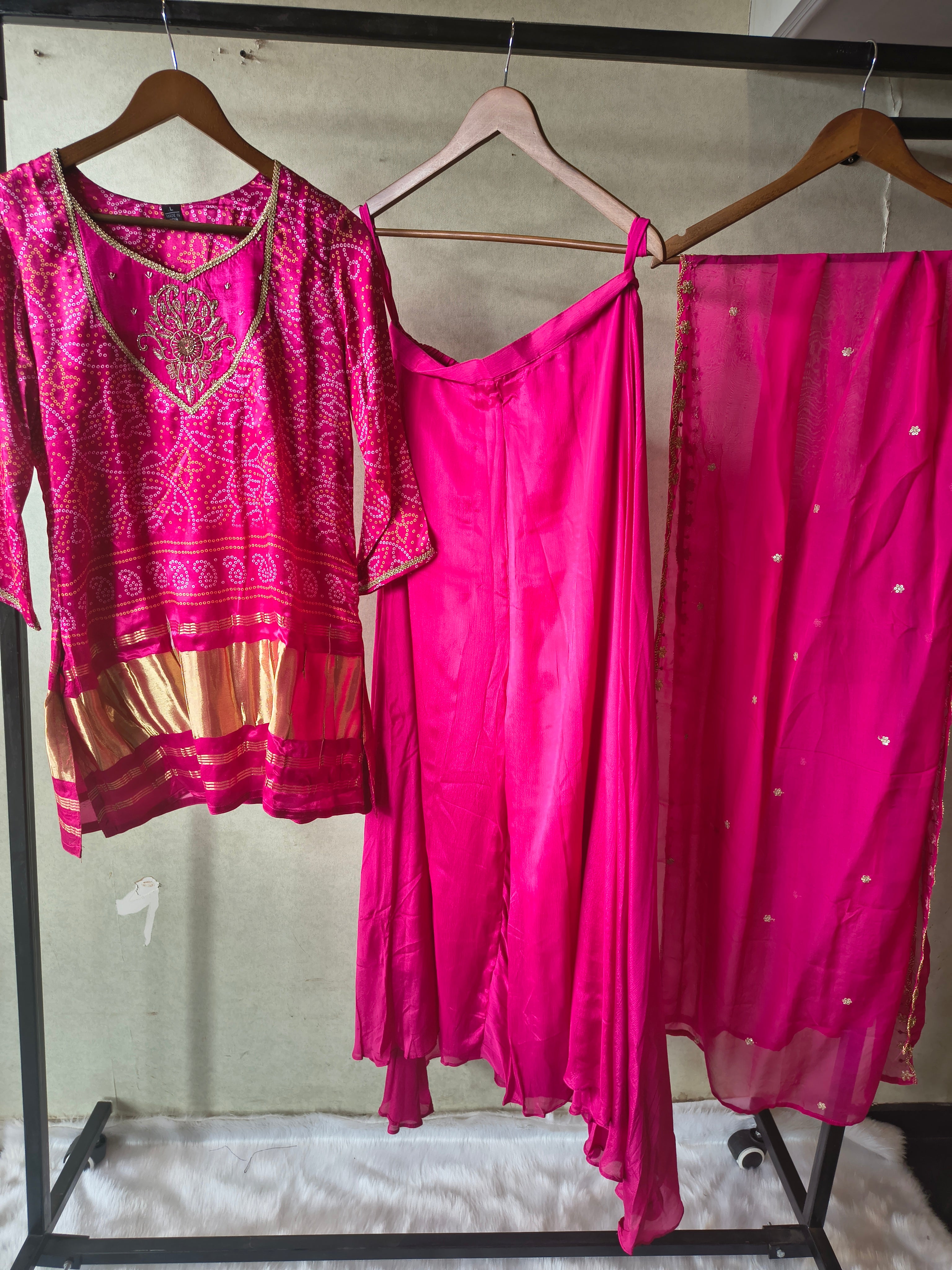 Image of Rani Pink Bandhani Sharara Set with Zari Border & Embroidered Dupatta – Premium 3 Piece Festive Ensemble
