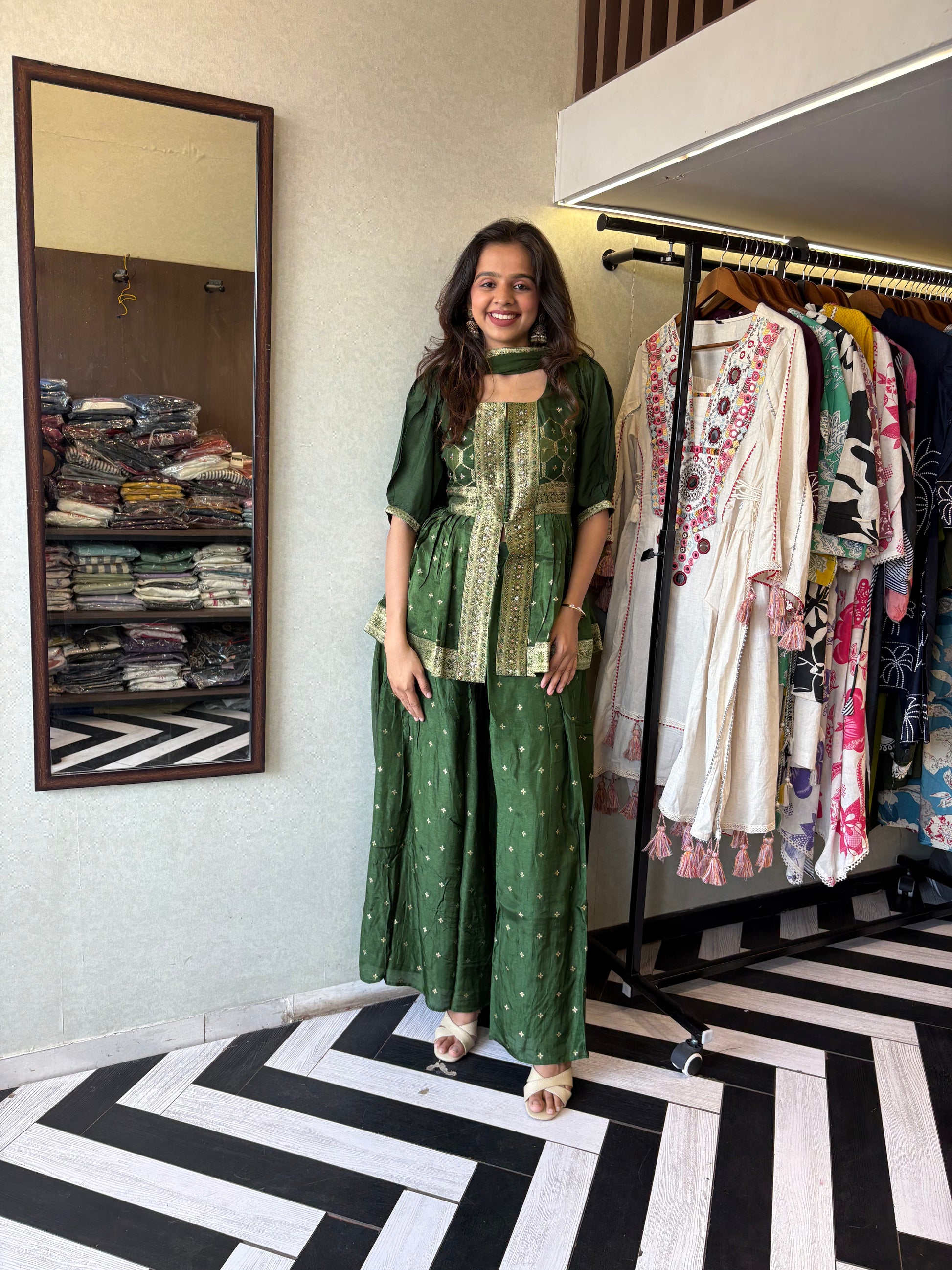 our premium pure silk 3-piece Indo-Western set in stunning green! From dazzling mirror & handwork on the jacket-style top to the flowing plazzo and dupatta