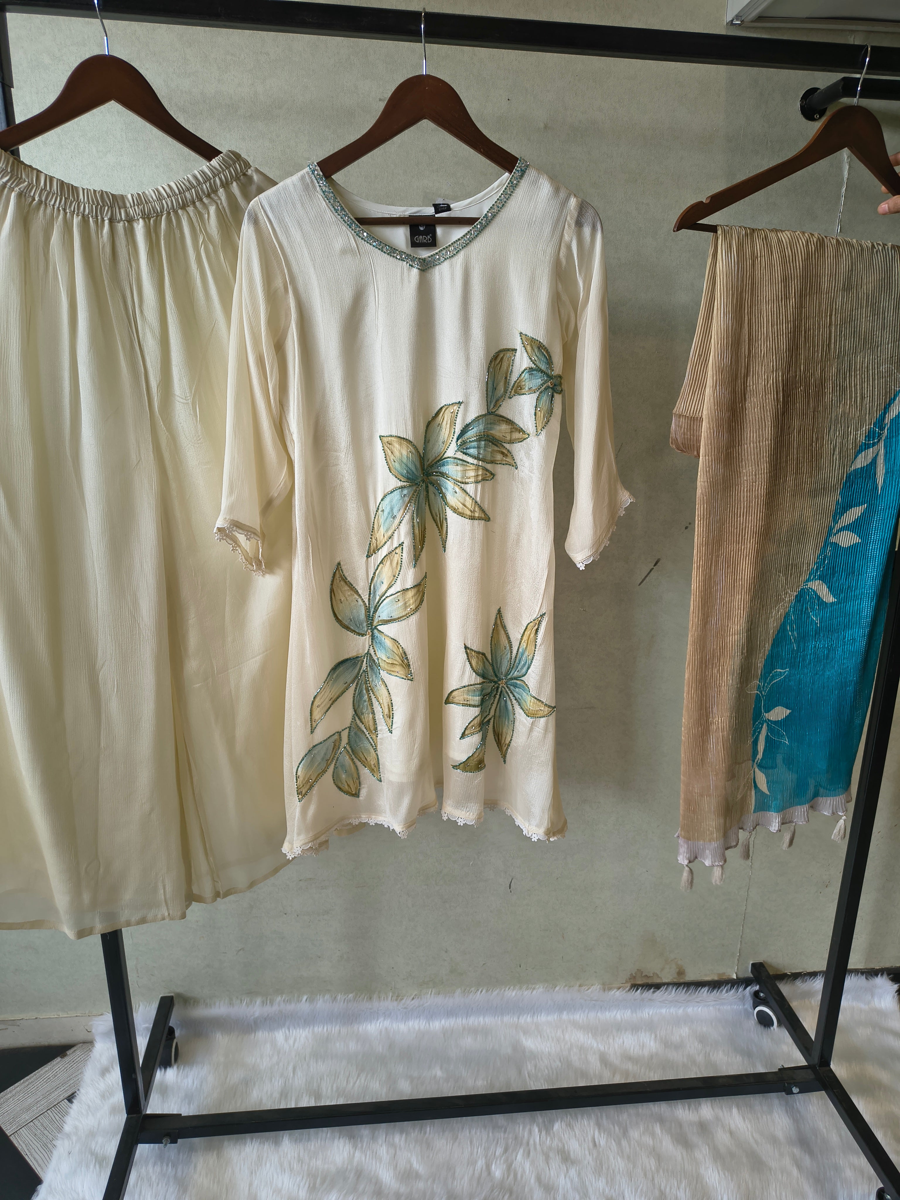 Image of Ivory Floral Hand-Painted Three-Piece Kurta Set with Palazzo & Ombre Dupatta