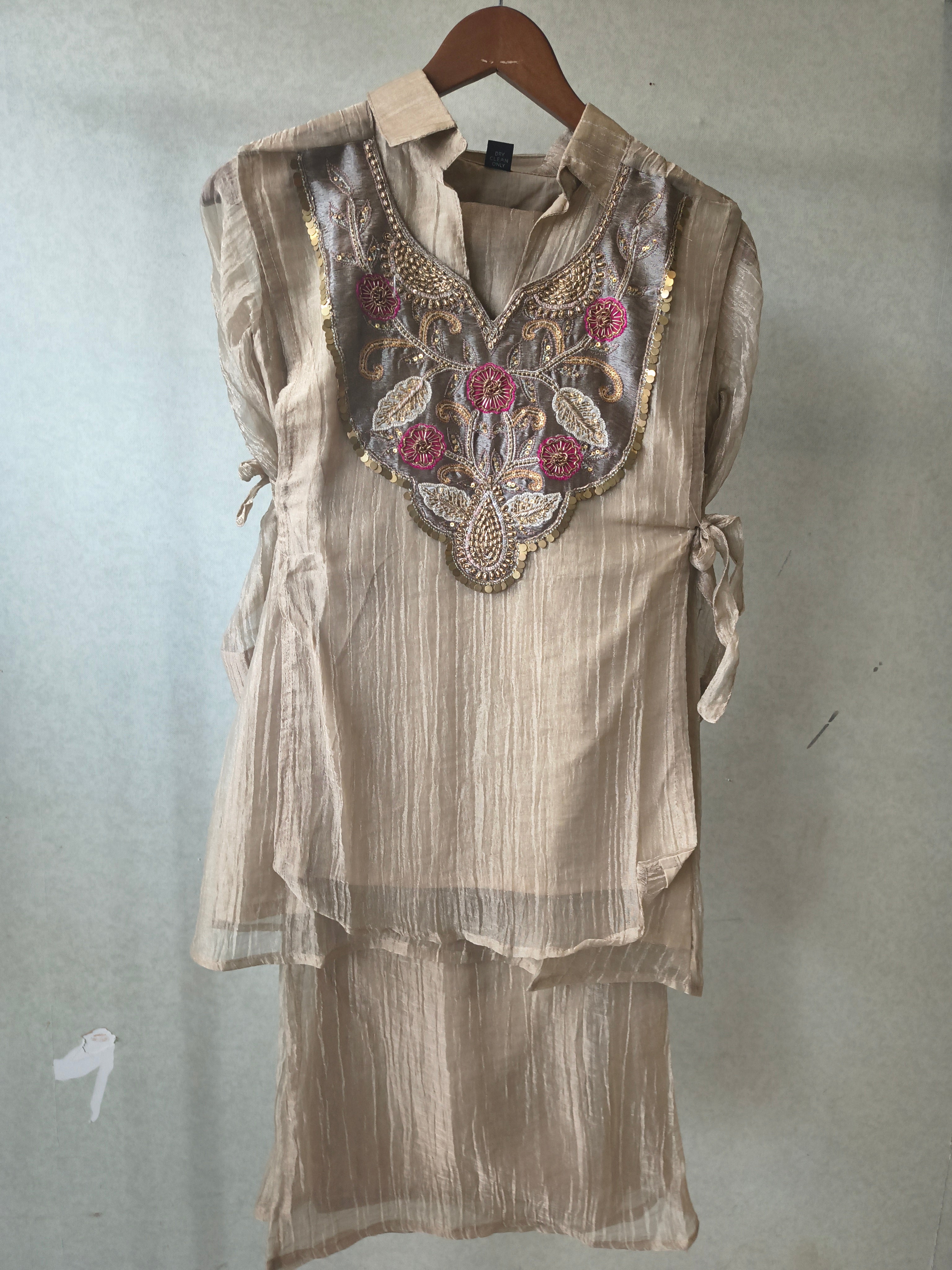 Image of Premium Champagne Tissue Silk Embroidered Kurta with Hand Embellished Statement Yoke