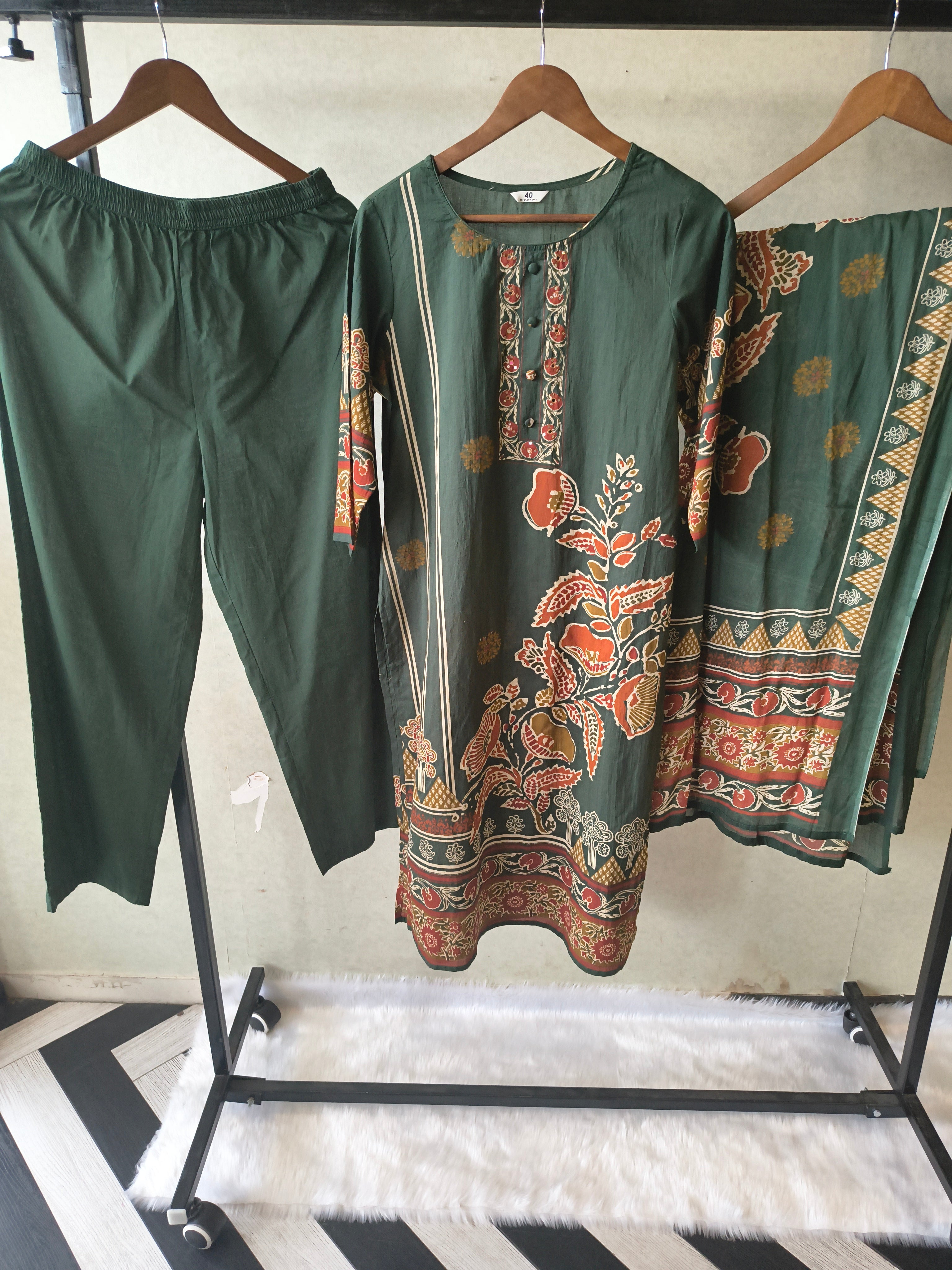 Image of Emerald Green Floral Printed Three-Piece Cotton Kurta Set with Dupatta