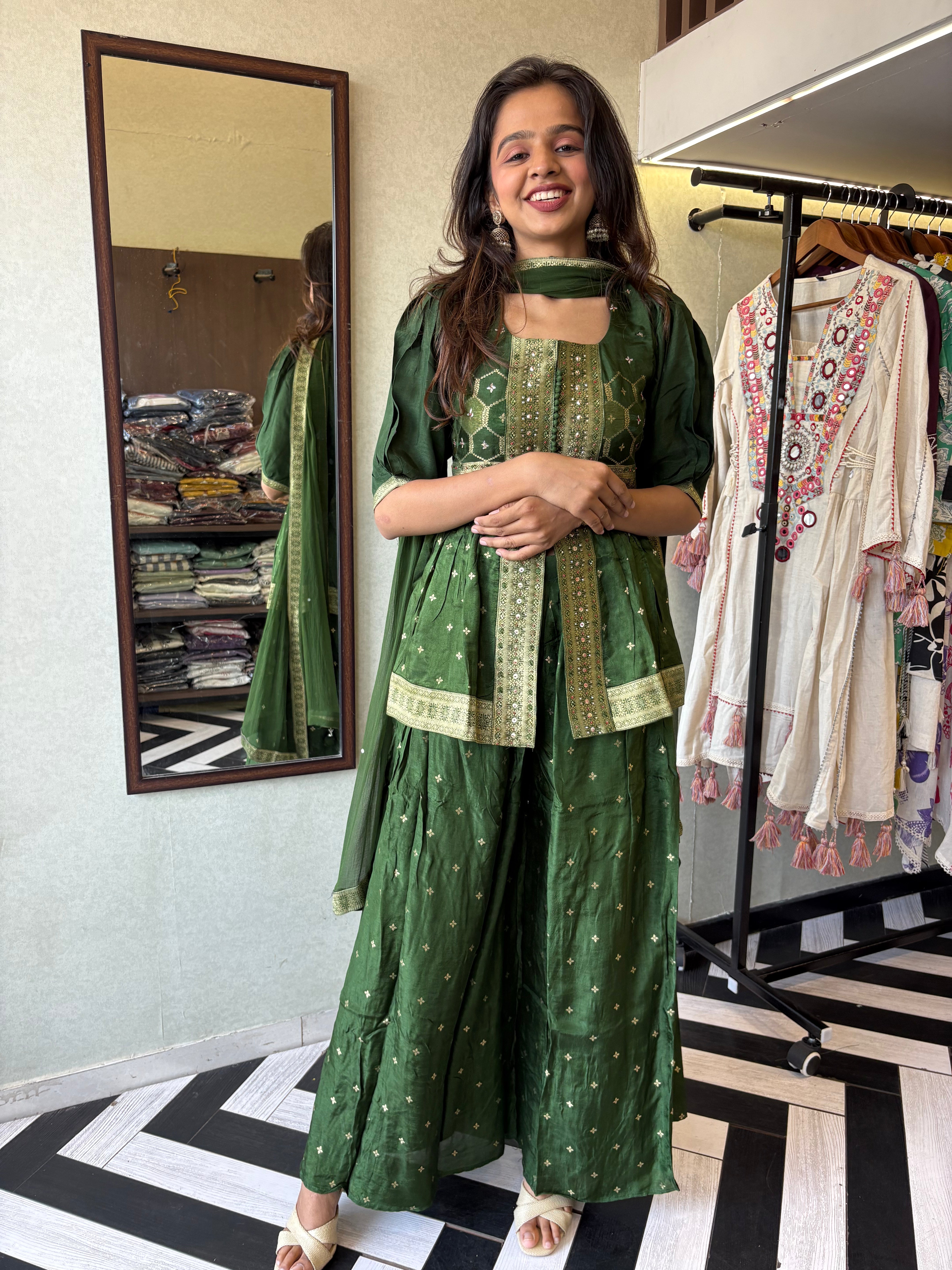 Image of our premium pure silk 3-piece Indo-Western set in stunning green! From dazzling mirror & handwork on the jacket-style top to the flowing plazzo and dupatta