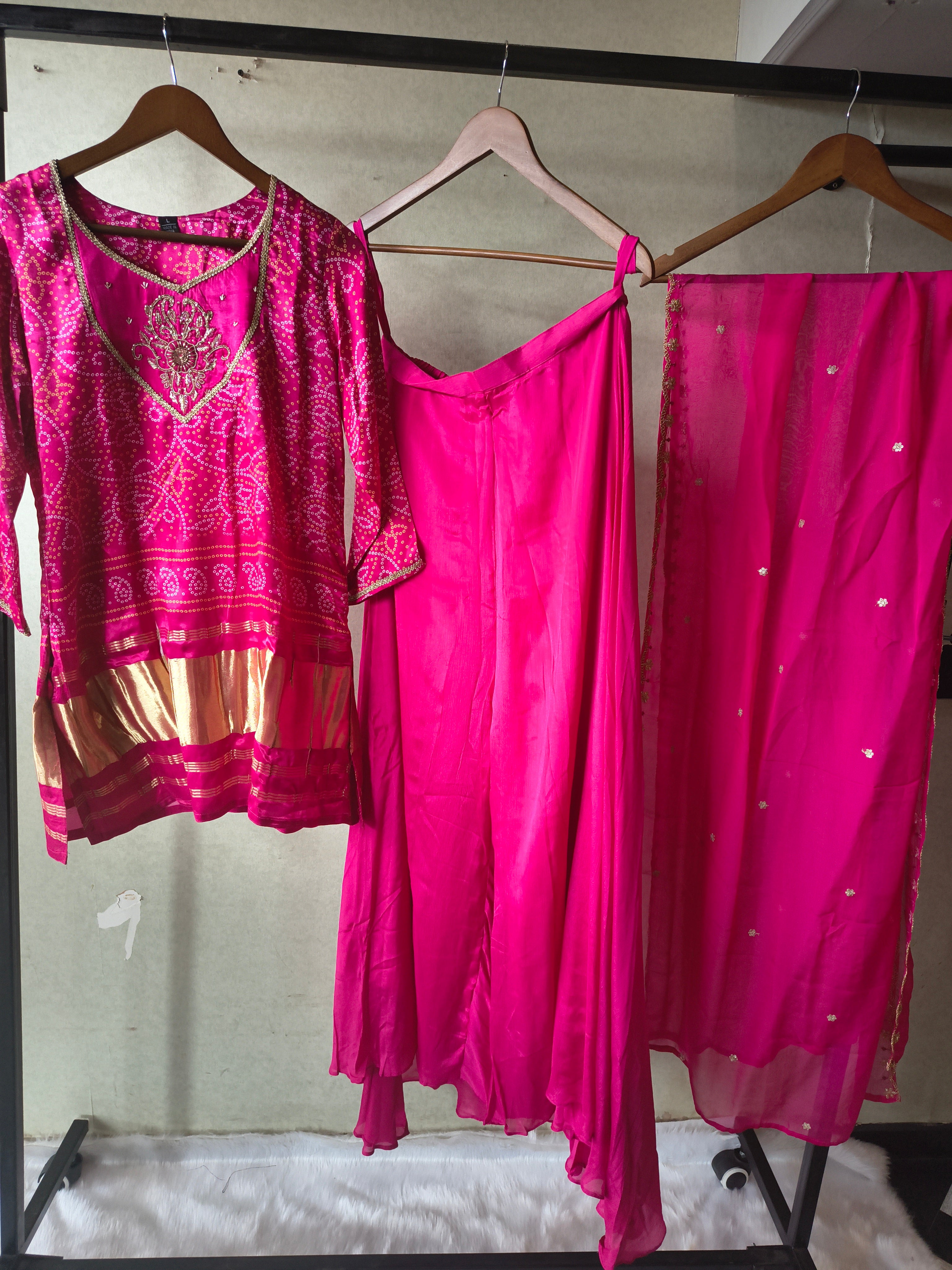Image of Rani Pink Bandhani Sharara Set with Zari Border & Embroidered Dupatta – Premium 3 Piece Festive Ensemble