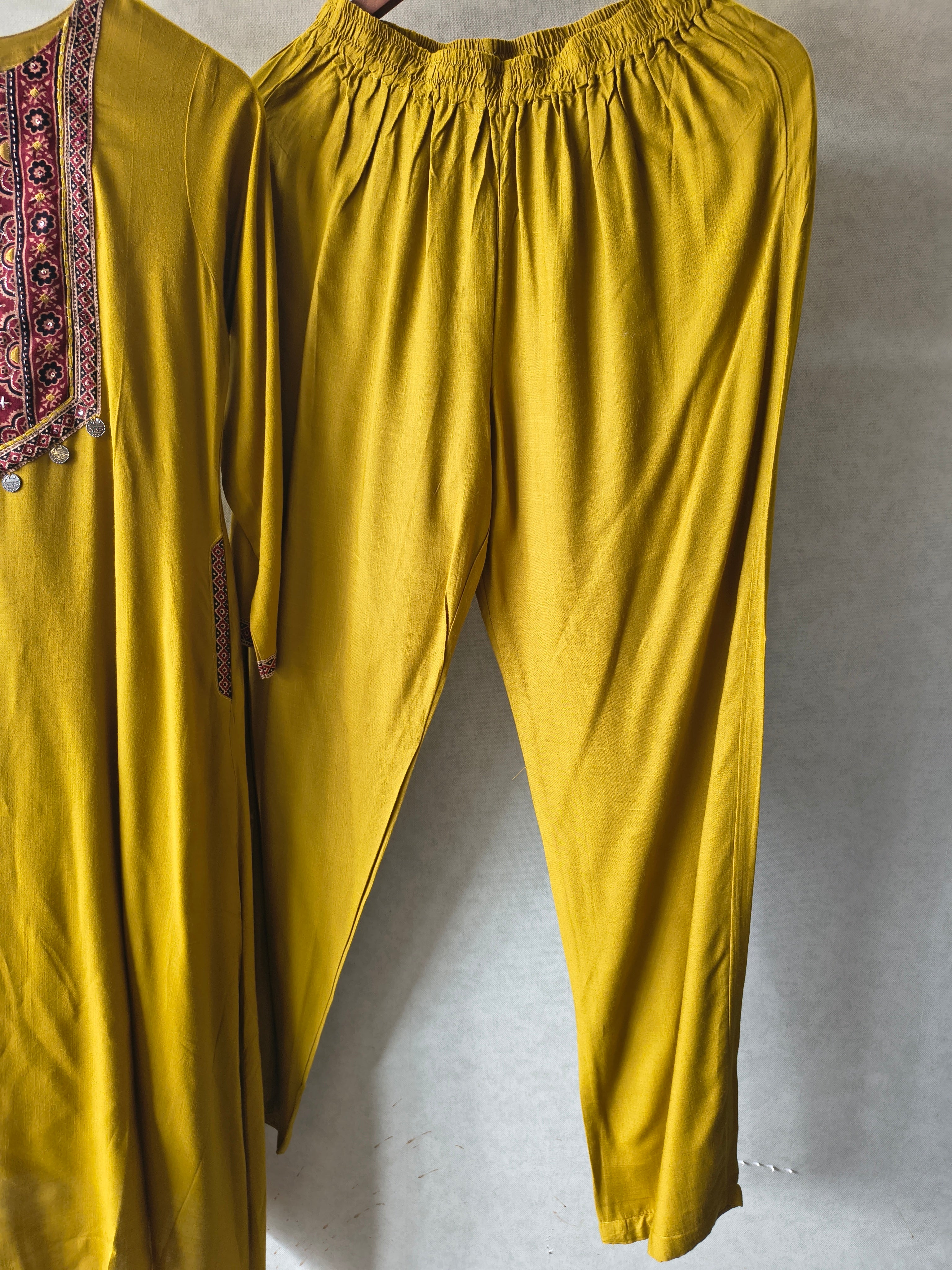 Image of Premium Mustard Ethnic Printed Yoke Kurta Pant Co-Ord Set with Tassel Hem