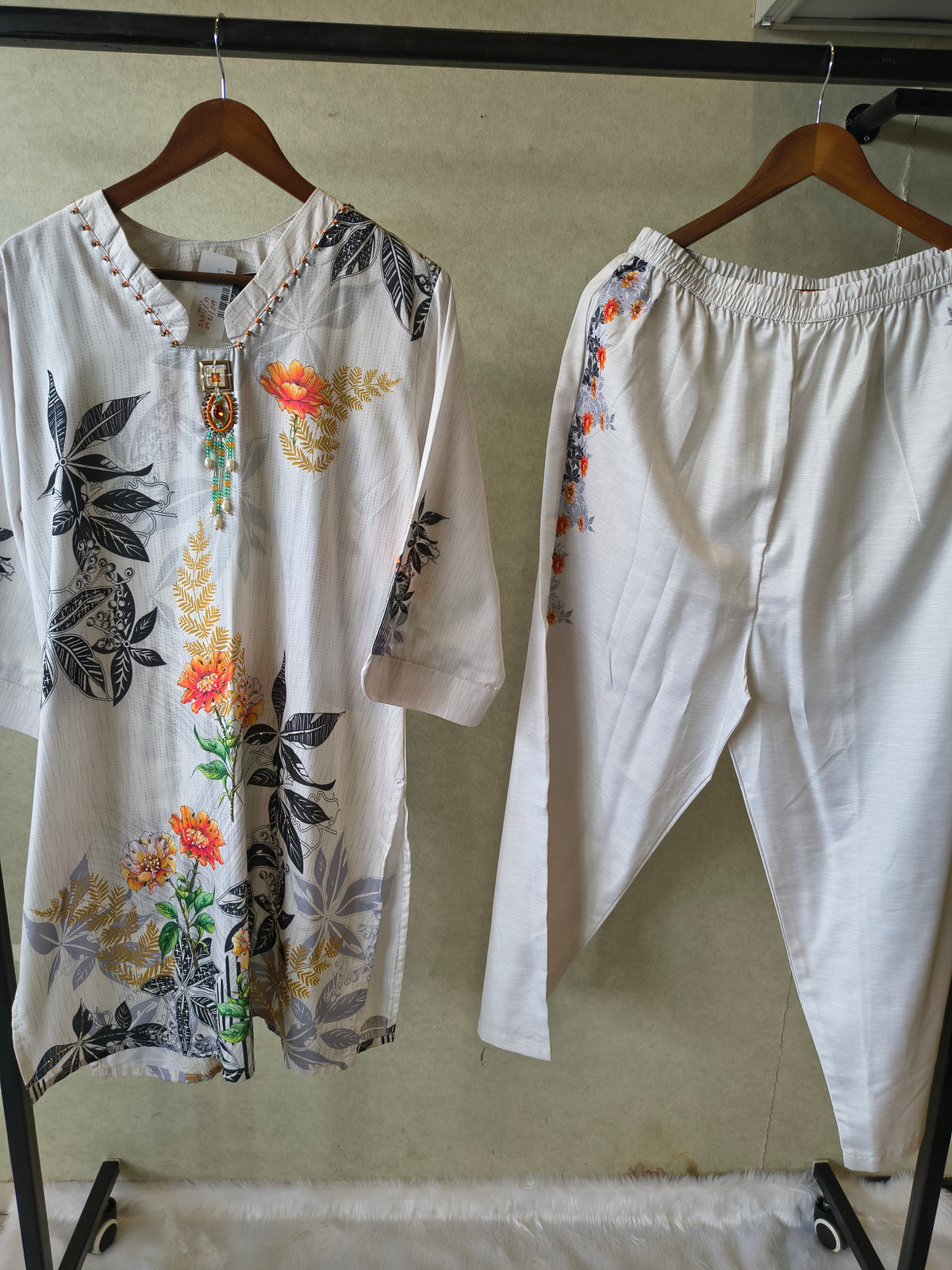 Premium Ivory Botanical Printed Kurta Set with Designer Pendant Neckline