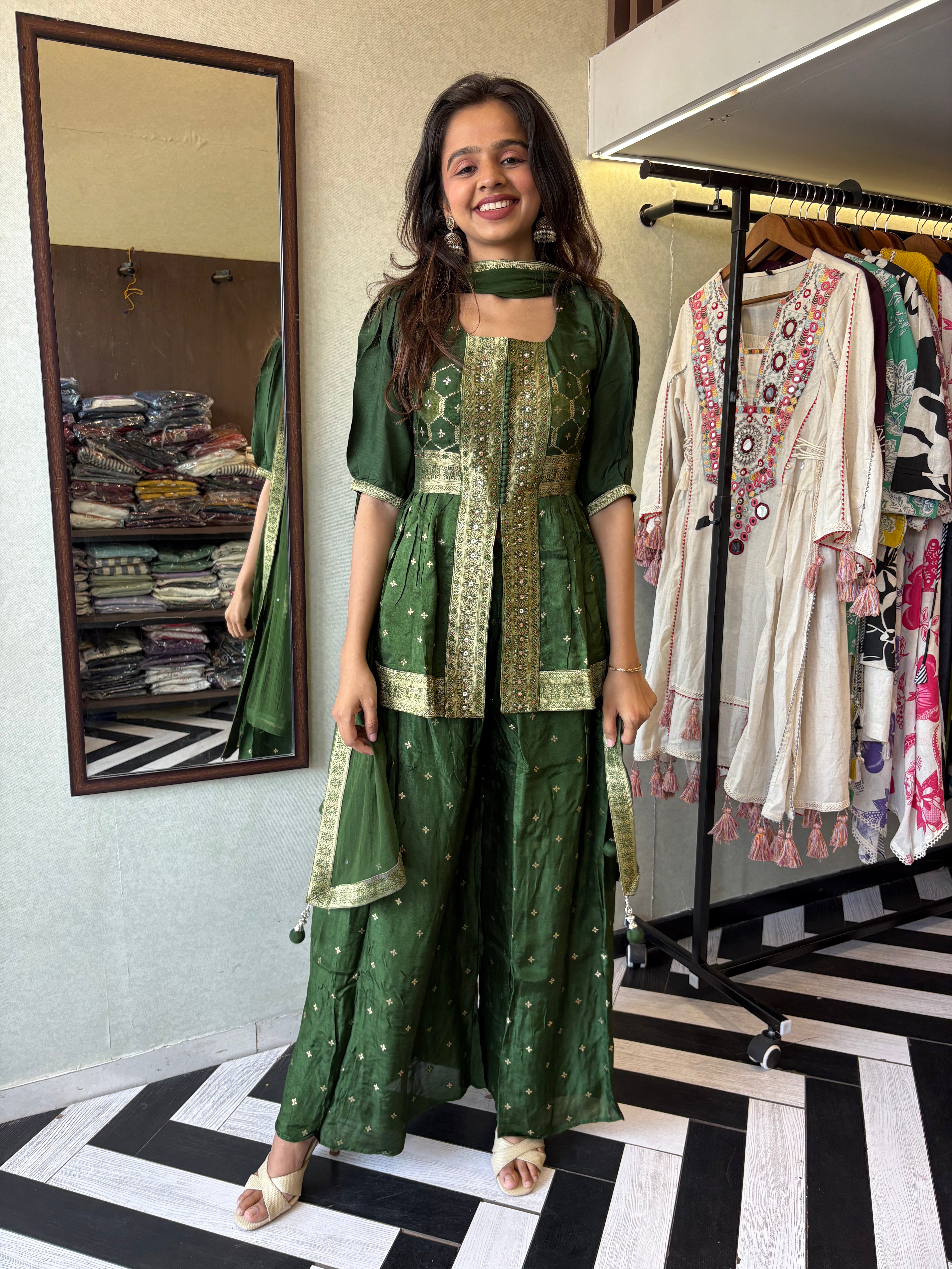 Image of our premium pure silk 3-piece Indo-Western set in stunning green! From dazzling mirror & handwork on the jacket-style top to the flowing plazzo and dupatta