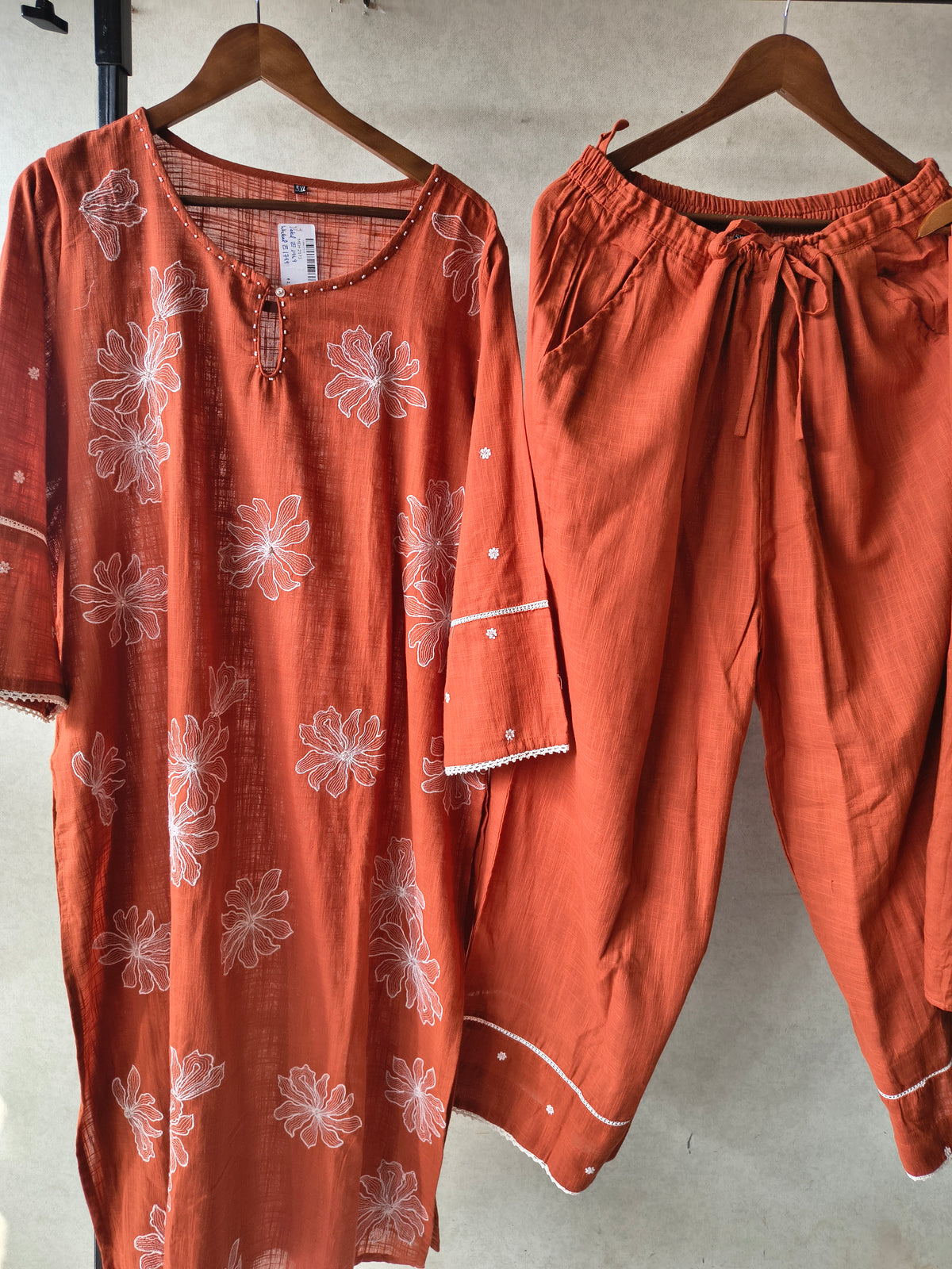 Rust Orange Floral Printed Cotton Kurta Set with Solid Pants & Embroidered Dupatta