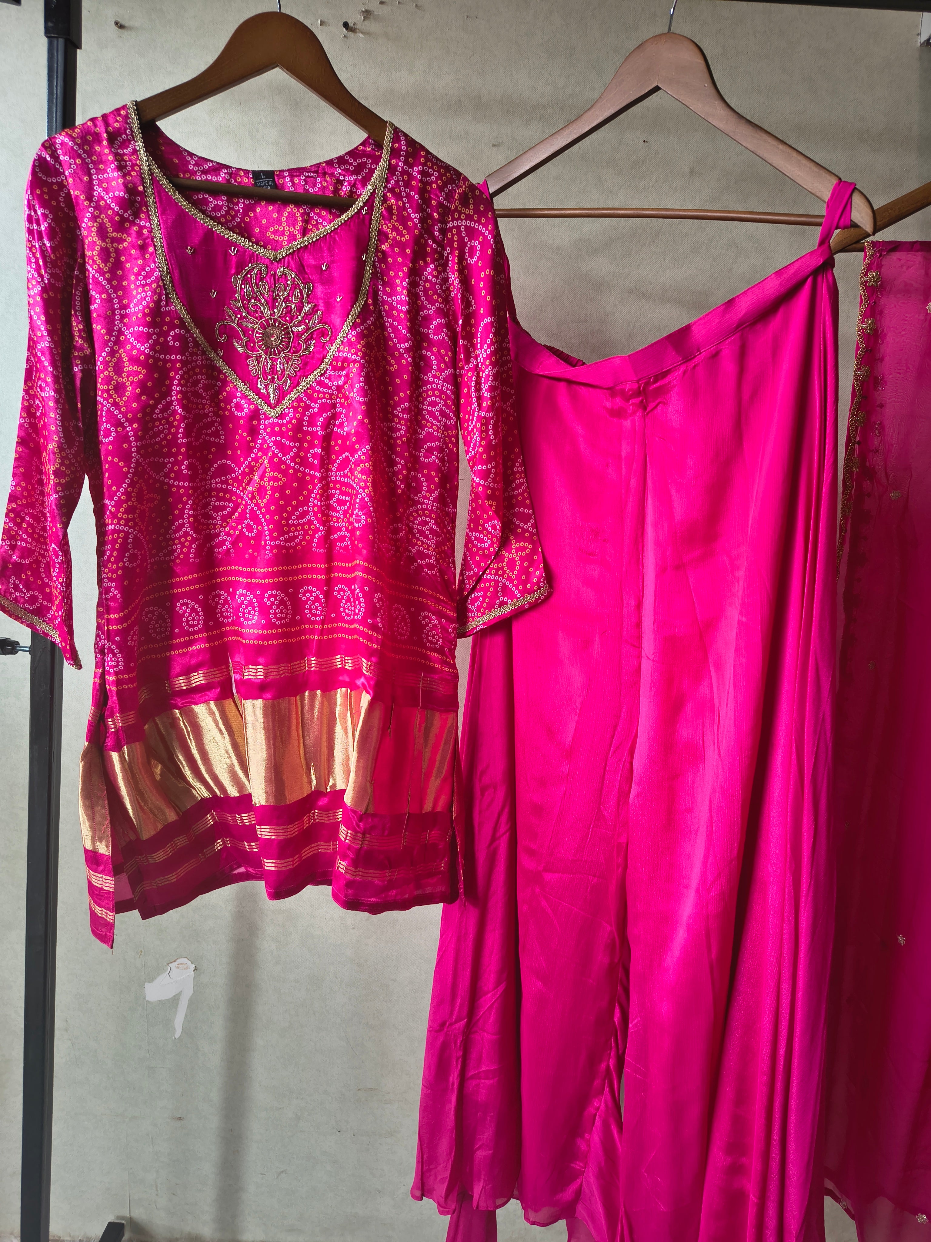 Image of Rani Pink Bandhani Sharara Set with Zari Border & Embroidered Dupatta – Premium 3 Piece Festive Ensemble