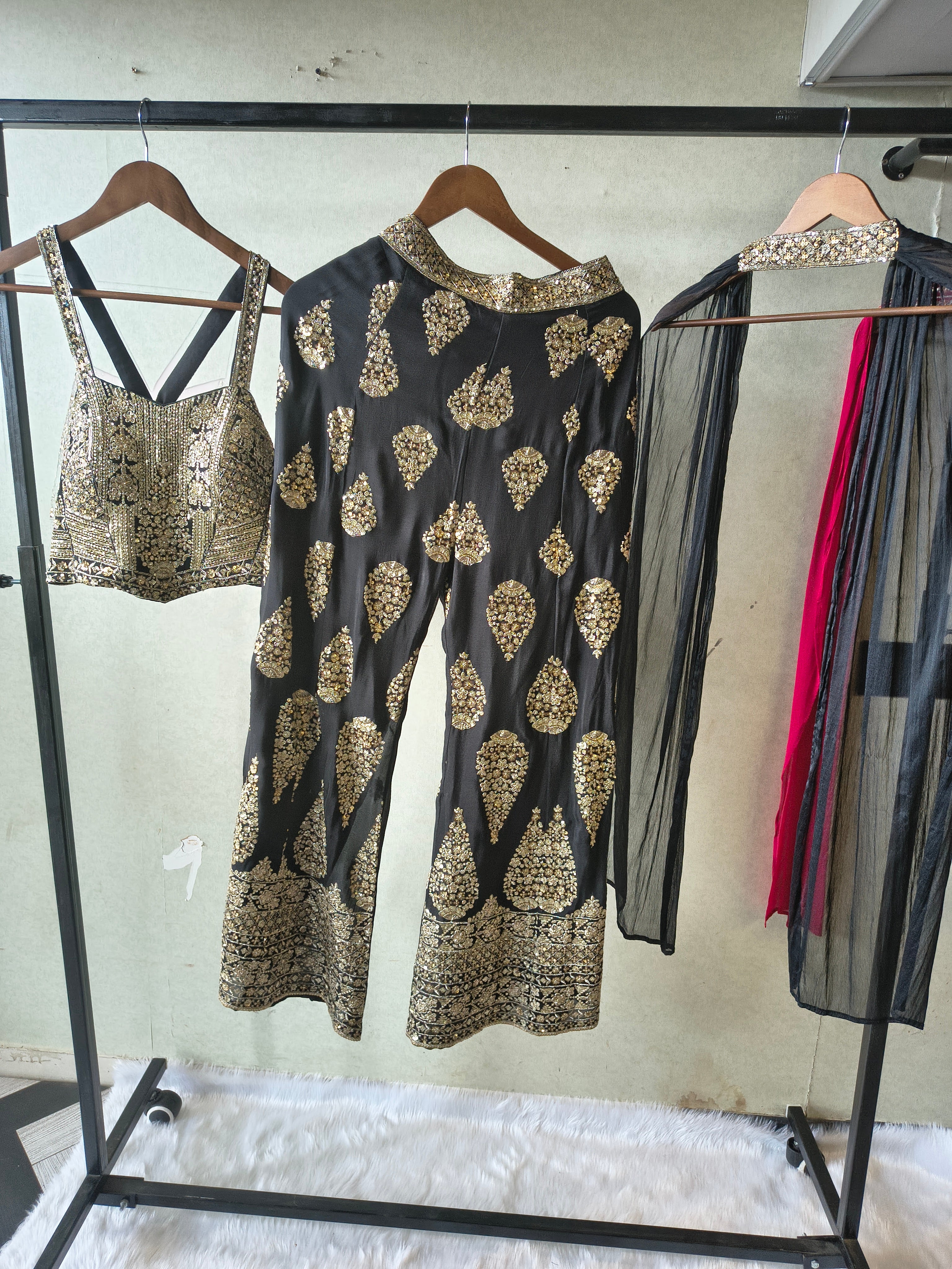 Image of Luxury Black Hand-Embroidered Bustier & Palazzo Set with Embellished Net Dupatta – 3 Piece Designer Ensemble