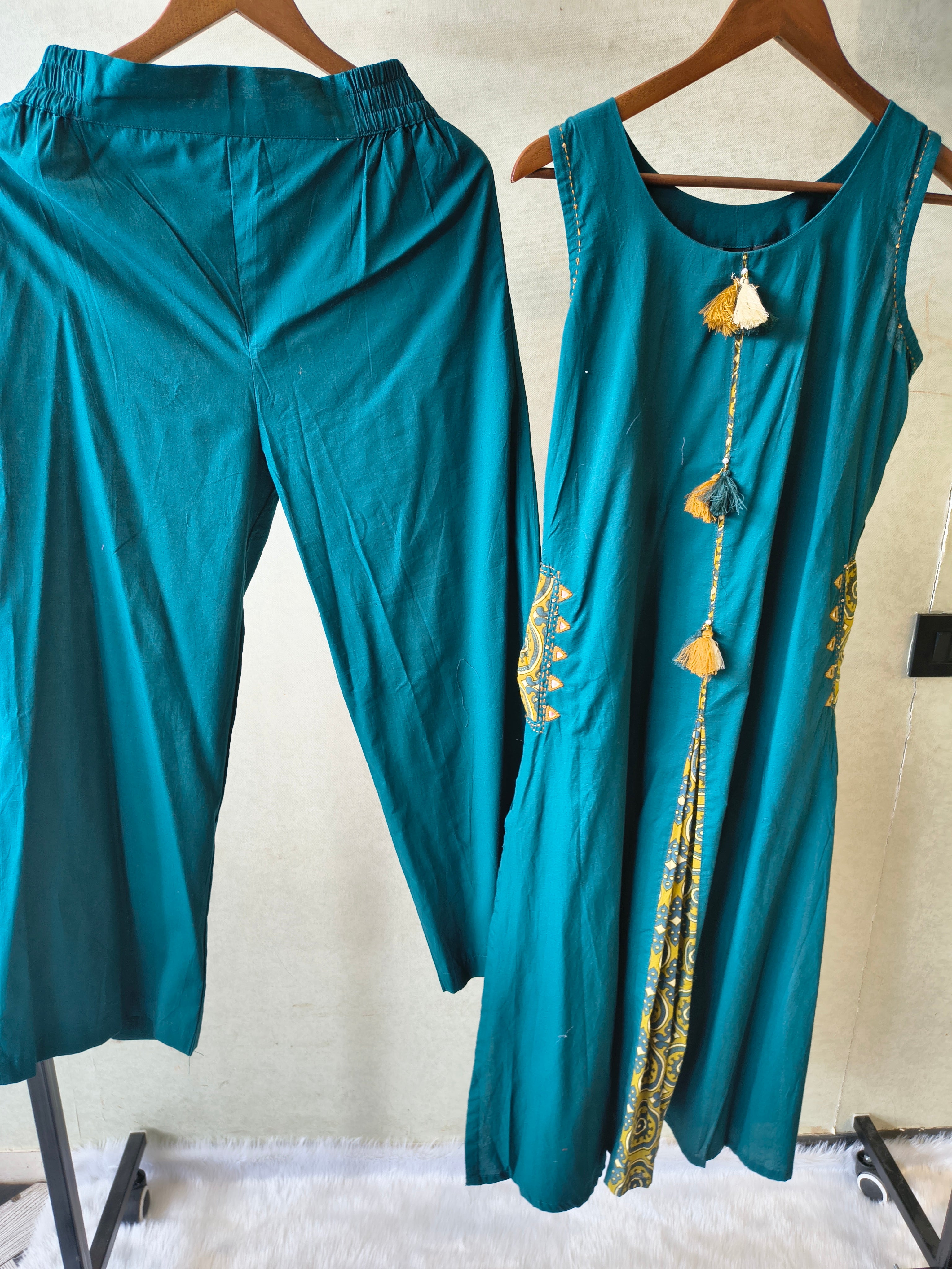 Image of Teal Sleeveless A-Line Kurta Set with Printed Panel & Straight Pants