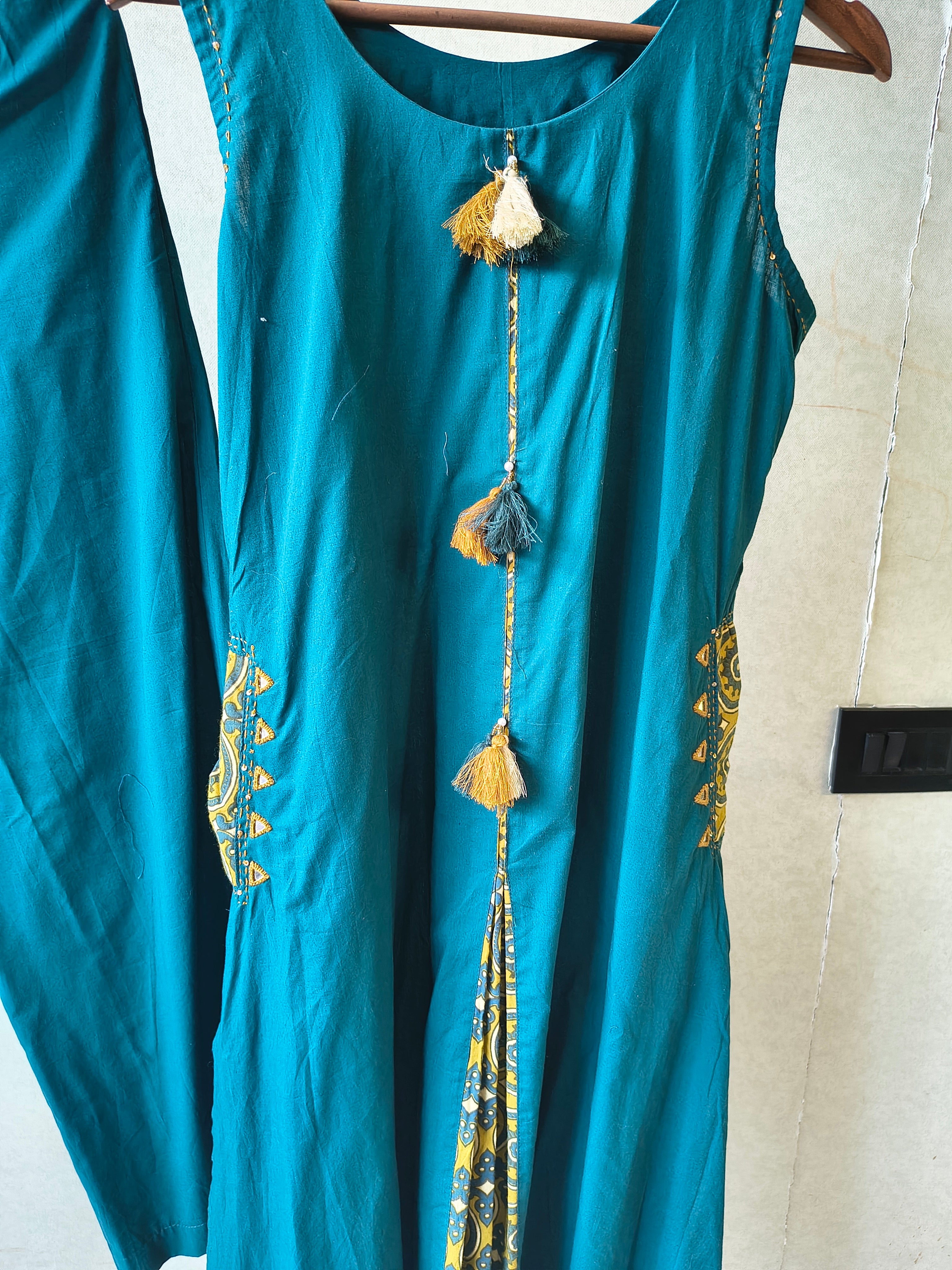 Image of Teal Sleeveless A-Line Kurta Set with Printed Panel & Straight Pants