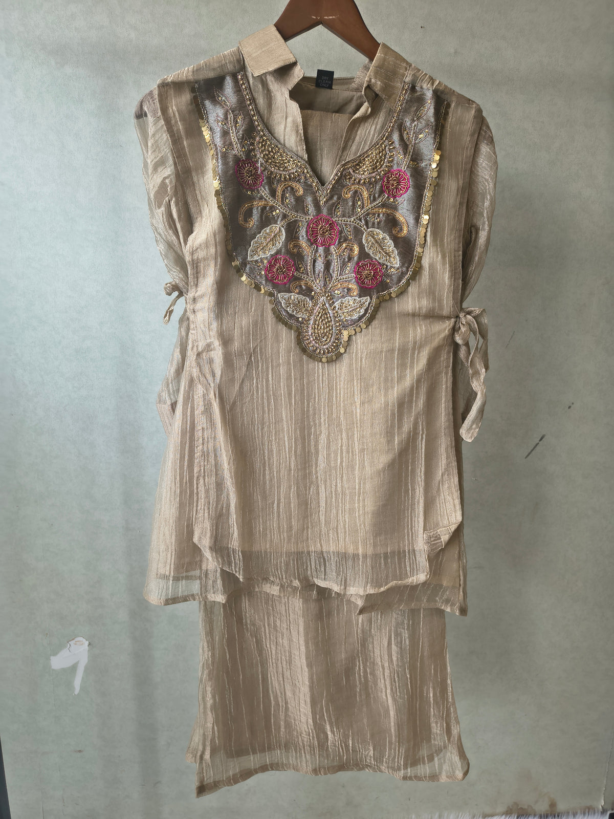 Premium Champagne Tissue Silk Embroidered Kurta with Hand Embellished Statement Yoke