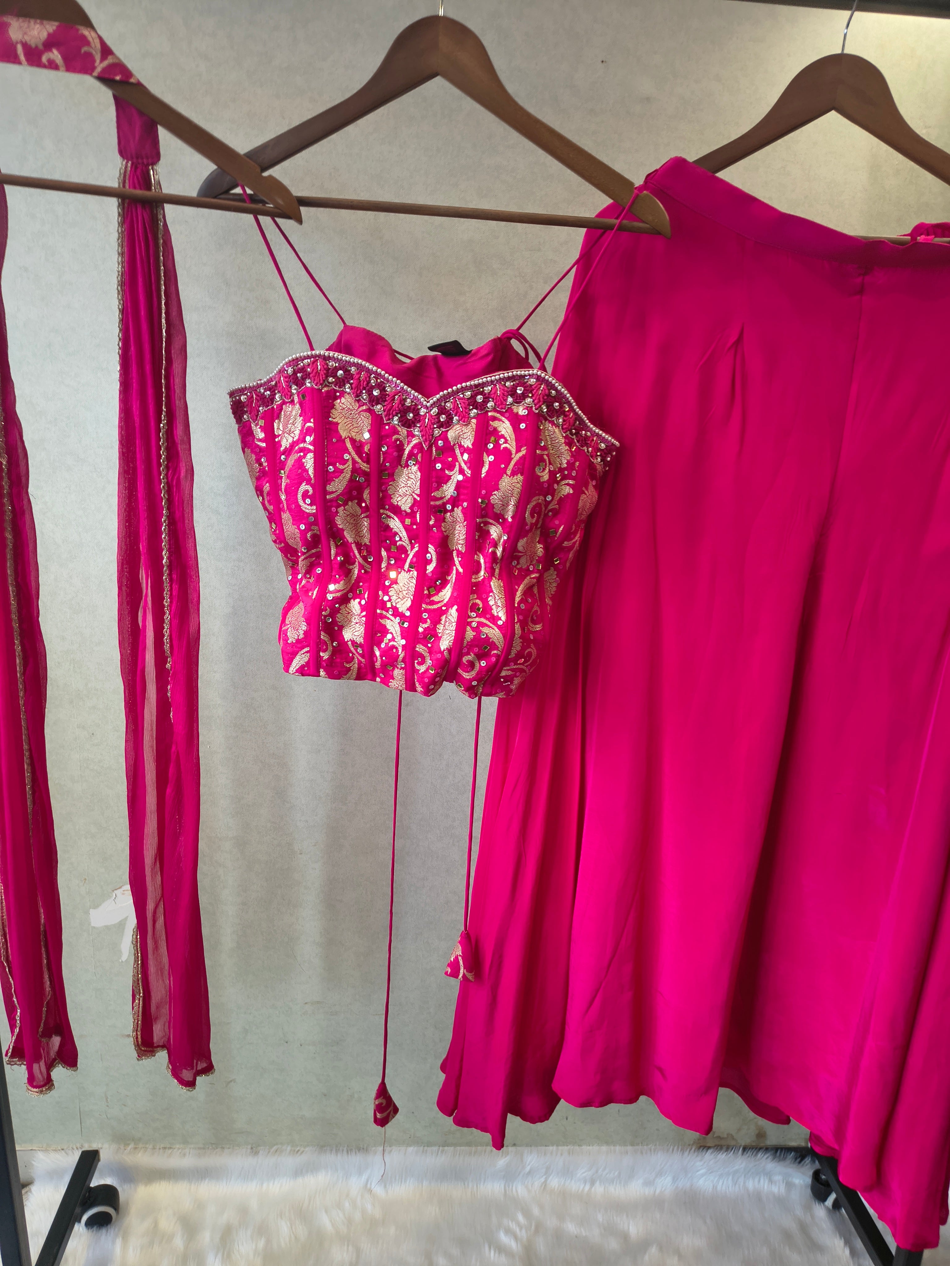 Image of Luxury Rani Pink Corset Blouse with Flared Palazzo & Embellished Choker Dupatta – 3 Piece Designer Indo-Western Set