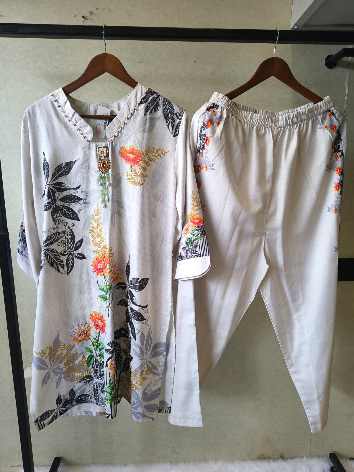 Premium Ivory Botanical Printed Kurta Set with Designer Pendant Neckline