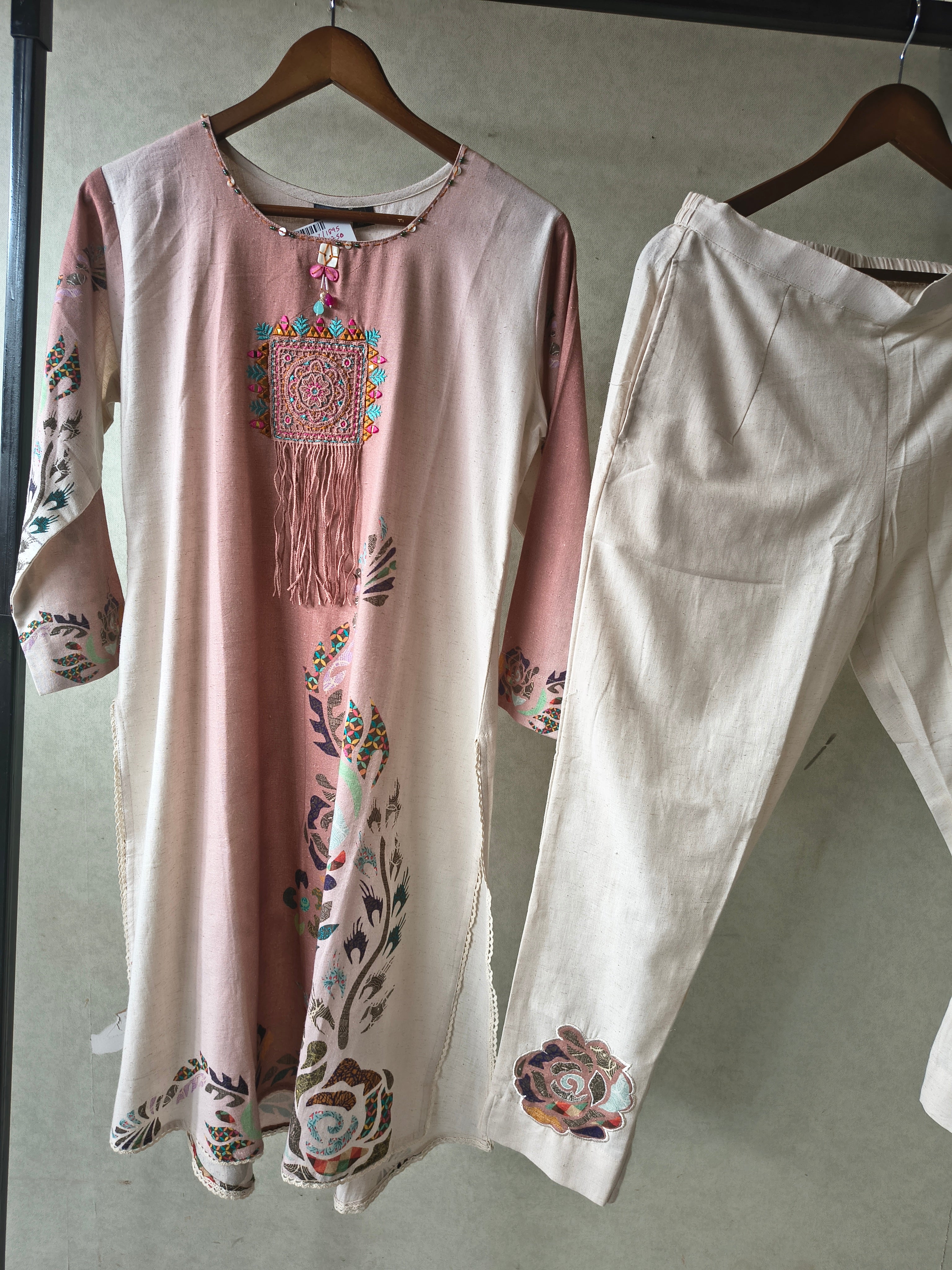 Image of Premium Blush Pink Linen Blend Kurta Set with Handcrafted Embroidered Tassel Patch & Embroidered Pants
