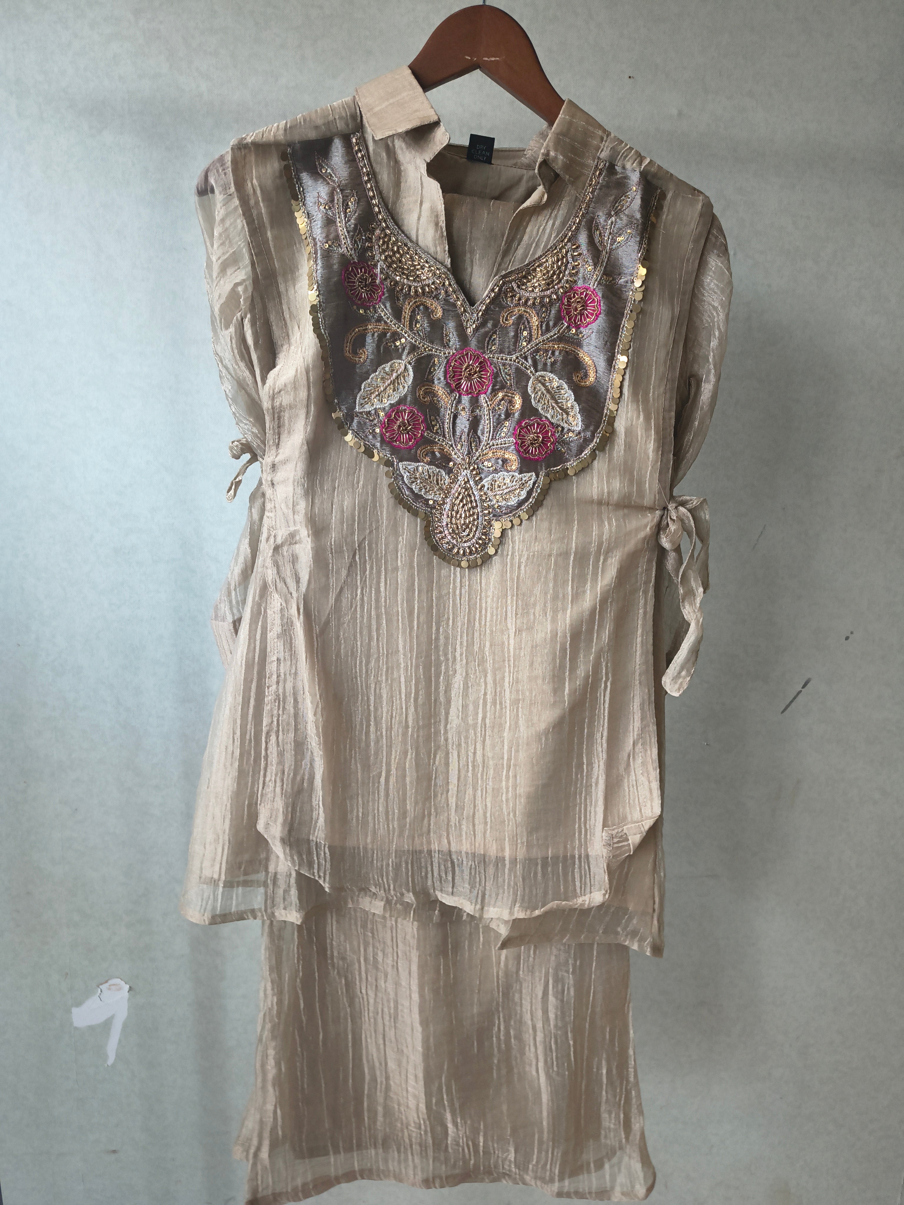 Image of Premium Champagne Tissue Silk Embroidered Kurta with Hand Embellished Statement Yoke
