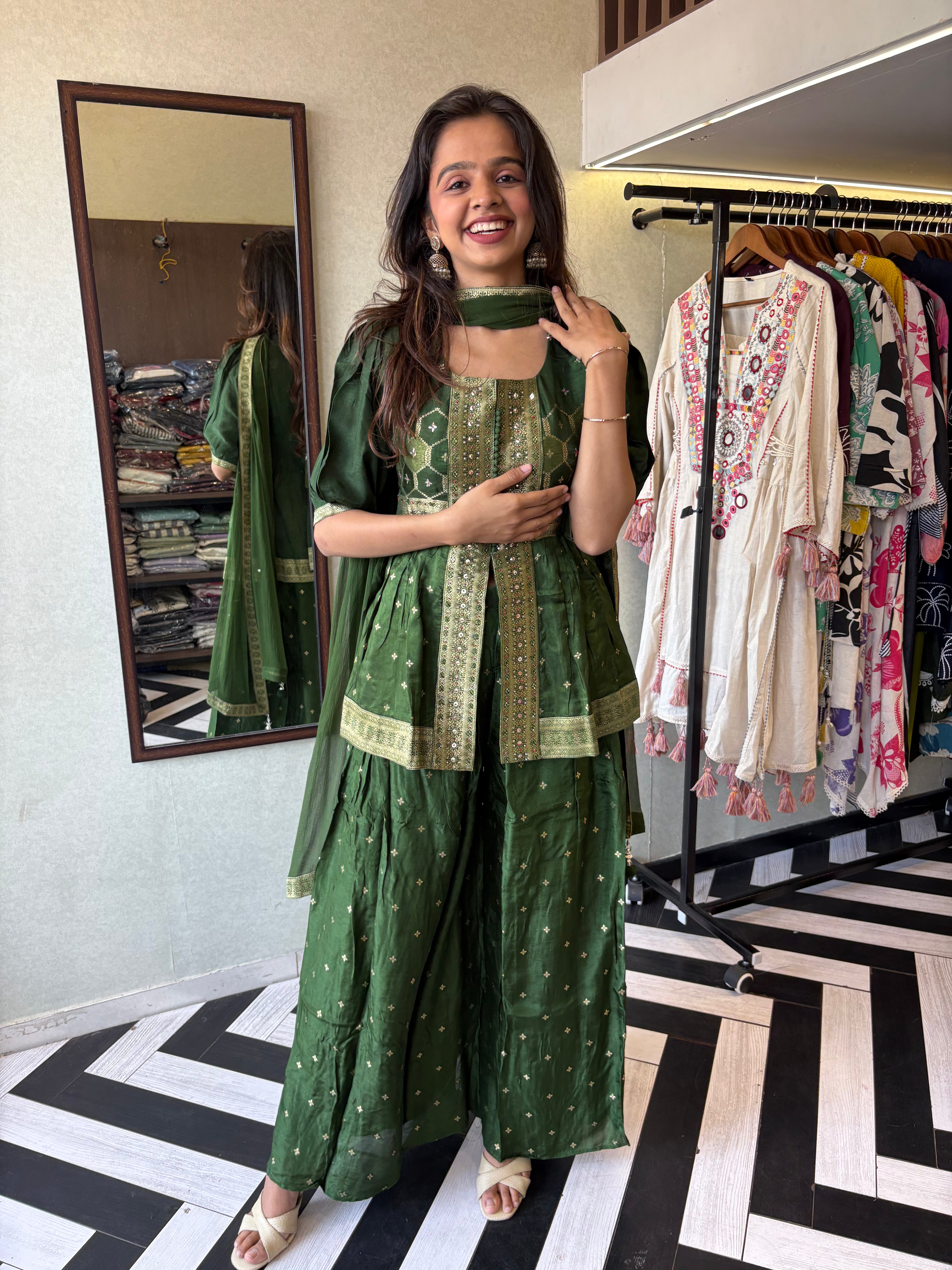 Image of our premium pure silk 3-piece Indo-Western set in stunning green! From dazzling mirror & handwork on the jacket-style top to the flowing plazzo and dupatta
