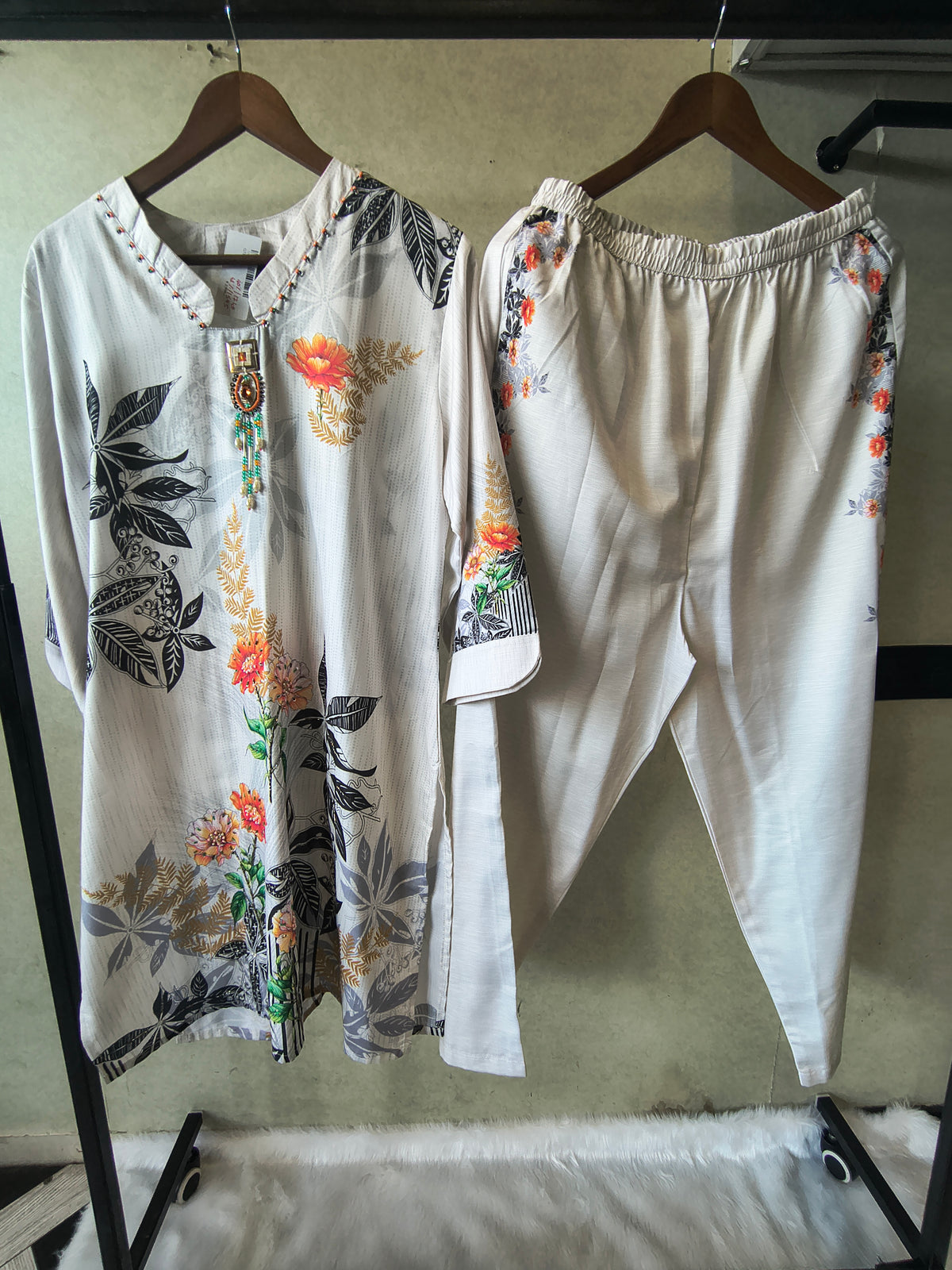 Premium Ivory Botanical Printed Kurta Set with Designer Pendant Neckline