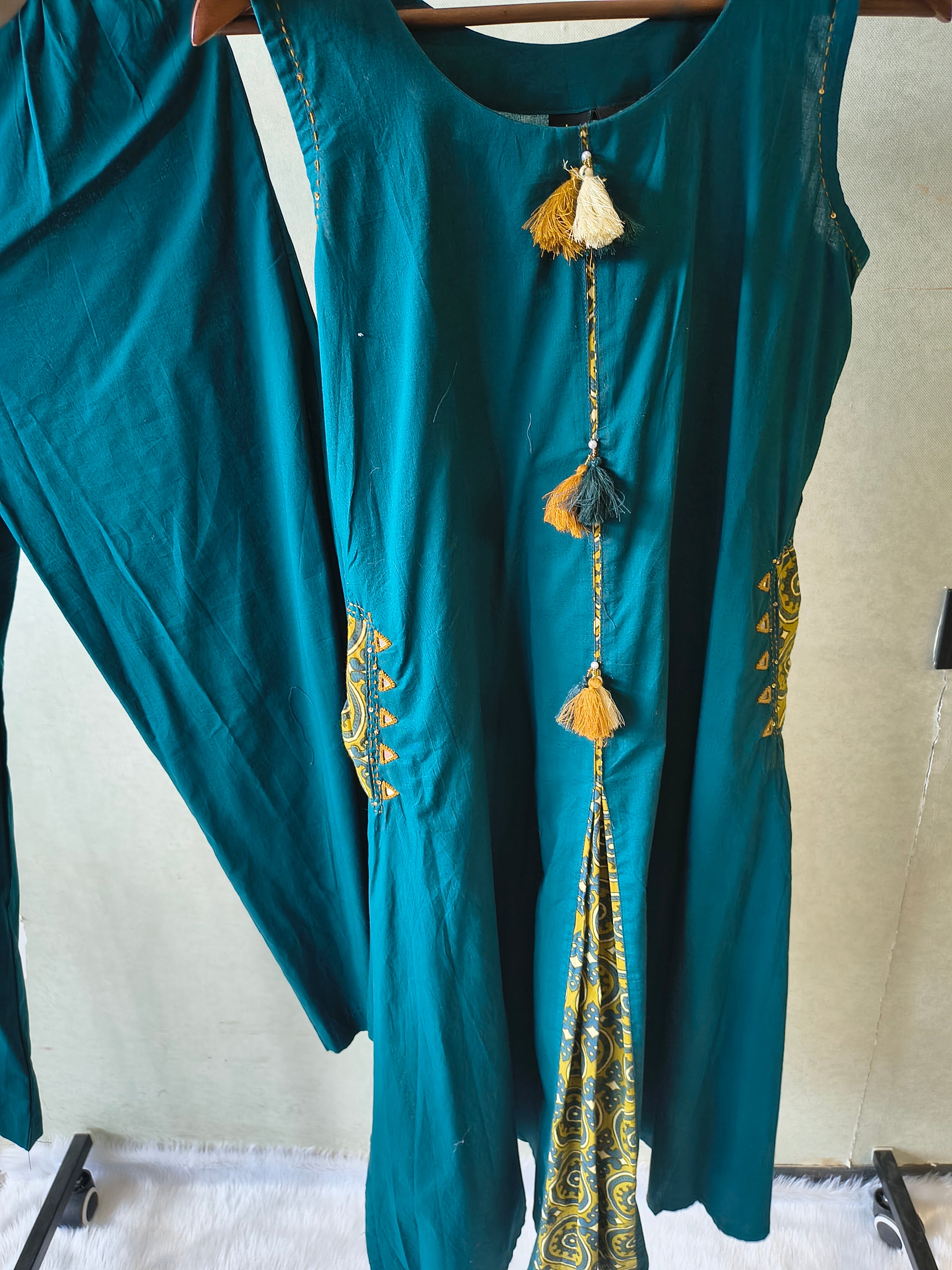 Image of Teal Sleeveless A-Line Kurta Set with Printed Panel & Straight Pants