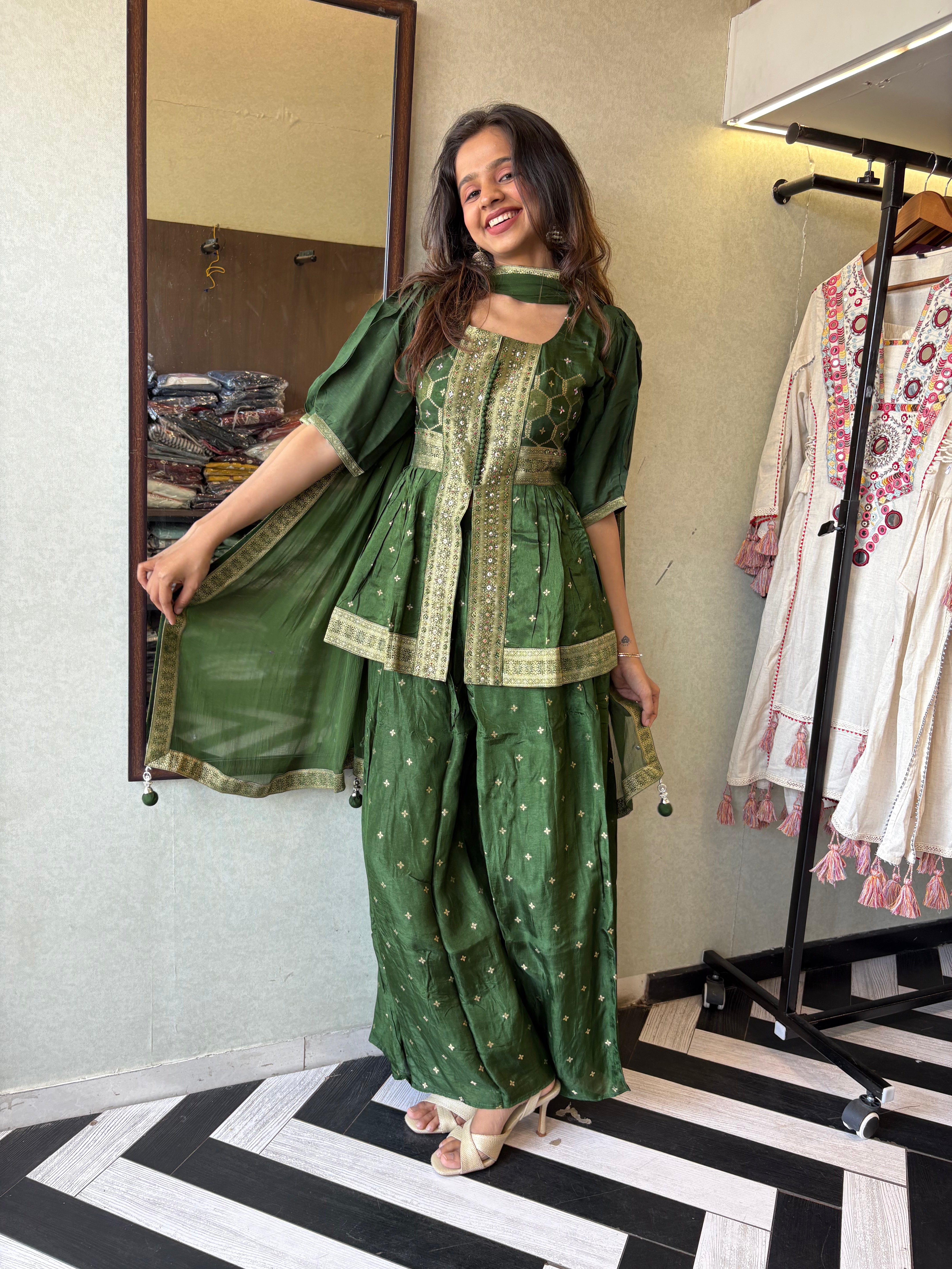 Image of our premium pure silk 3-piece Indo-Western set in stunning green! From dazzling mirror & handwork on the jacket-style top to the flowing plazzo and dupatta