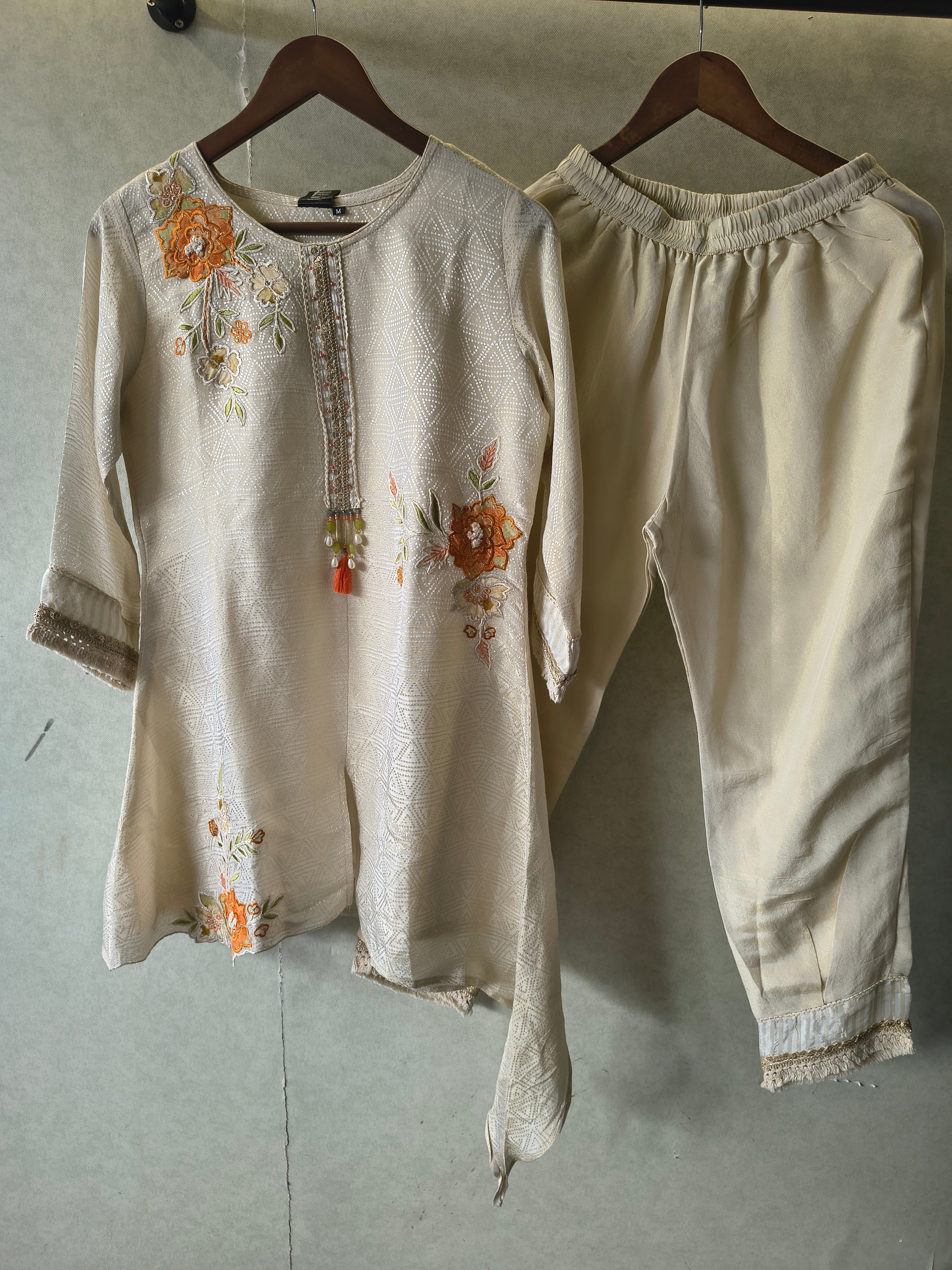 Image of Ivory Floral Embroidered Premium Asymmetrical Kurta Pant Co-Ord Set