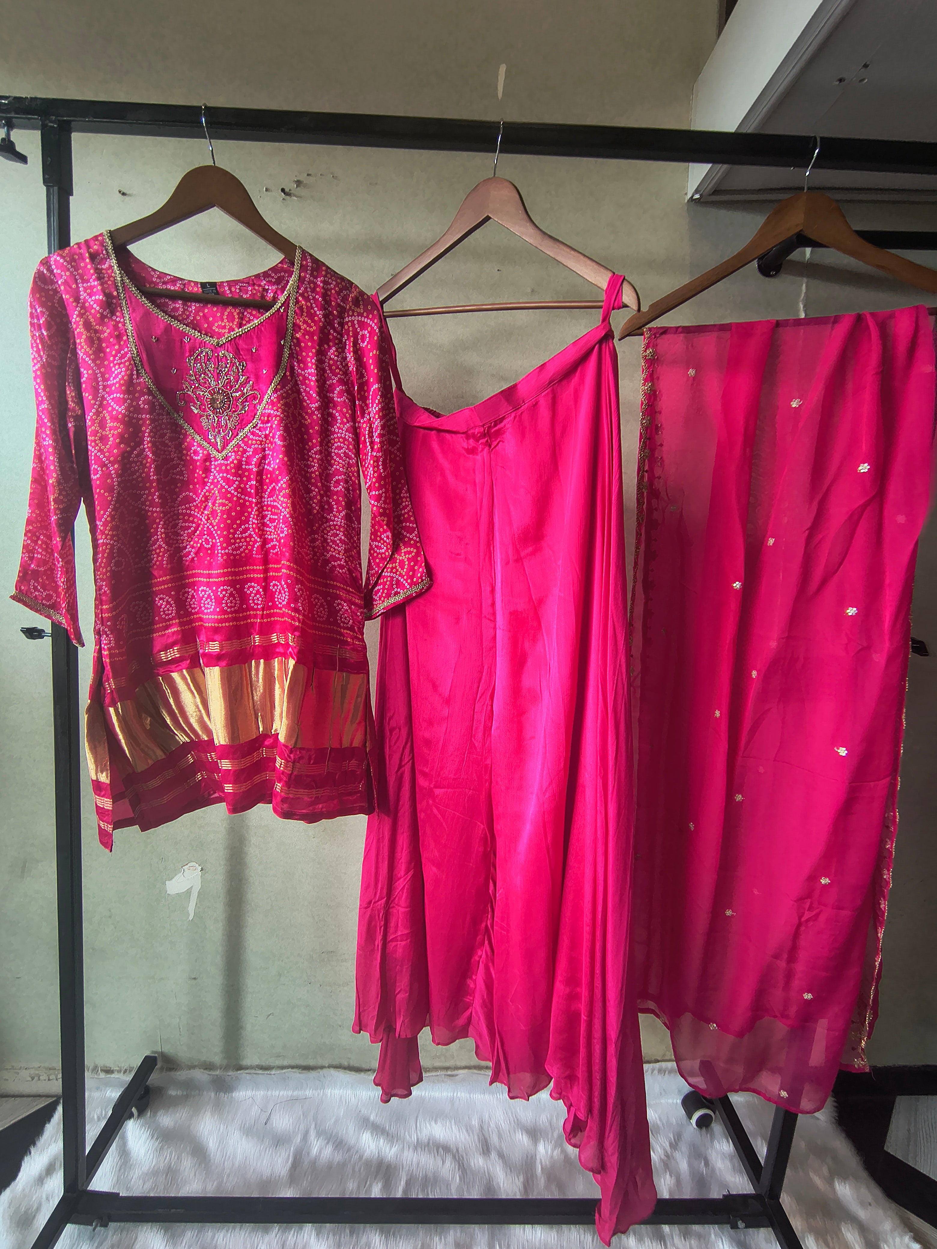 Image of Rani Pink Bandhani Sharara Set with Zari Border & Embroidered Dupatta – Premium 3 Piece Festive Ensemble