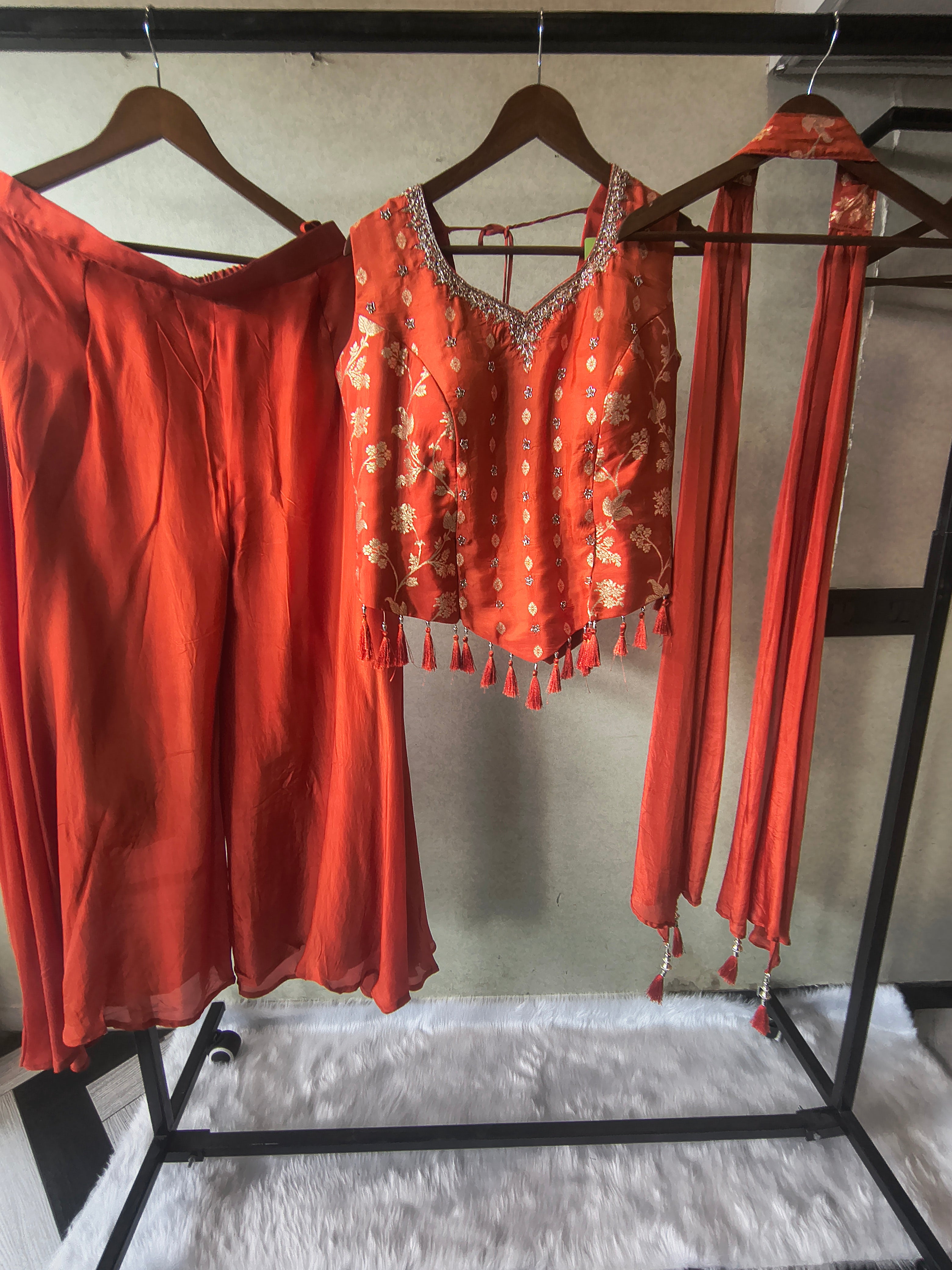 Image of Premium Rust Orange 3-Piece Designer Lehenga Set with Zari Embroidered Peplum Blouse & Tassel Dupatta