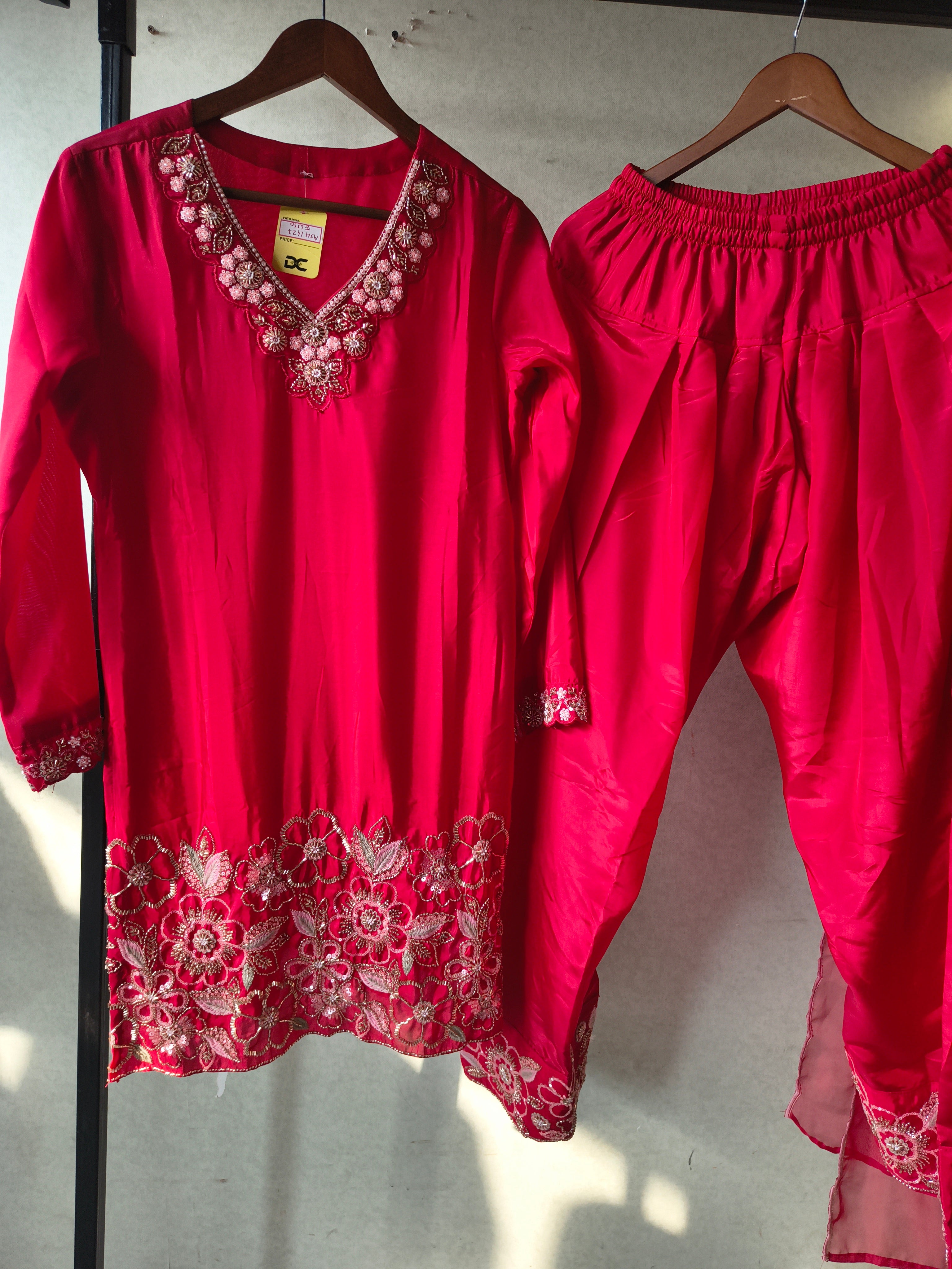 Image of Ruby Red Embroidered Straight Kurta Set with Floral Thread Work, Designer Neckline & Embellished Dupatta – Premium 3 Piece Ethnic Ensemble